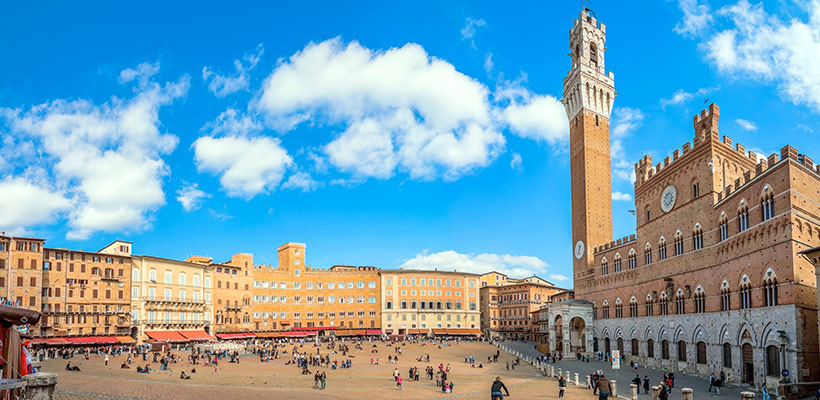 Visit the campo square in Siena while visiting Tuscany