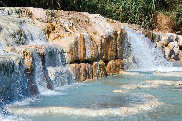 Relax in the natural Saturnia Spa during your stay in Tuscany